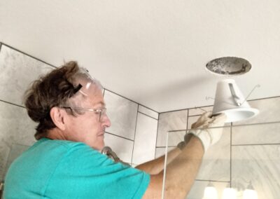 handyman repairing can lighting