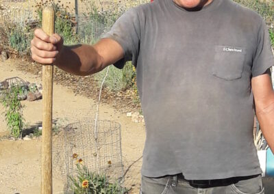 Tired handyman working in the garden